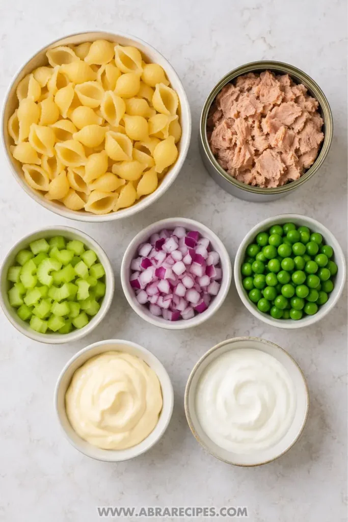 ingredients for tuna macaroni salad recipe laid out on counter