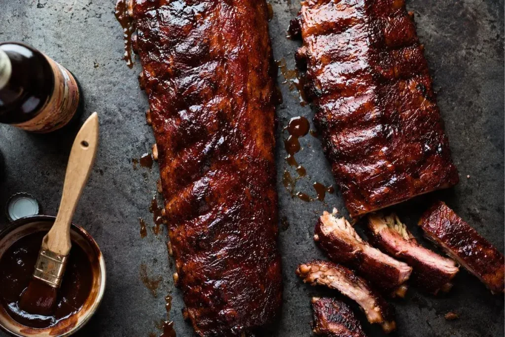 Sliced beef baby back ribs glazed with BBQ sauce